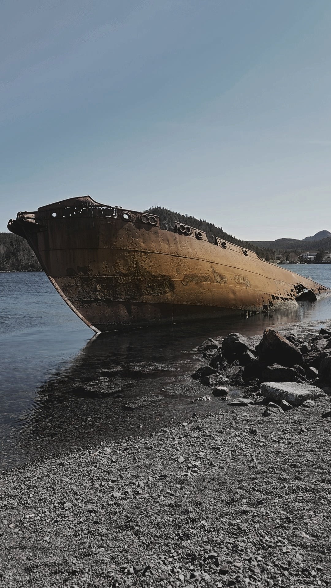Ruins of shipwreck in sea.