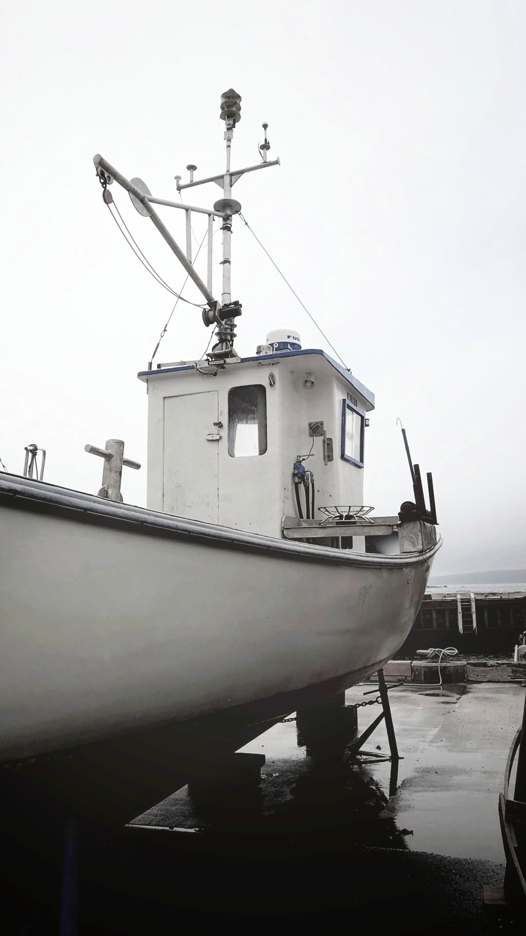White fishing boat.