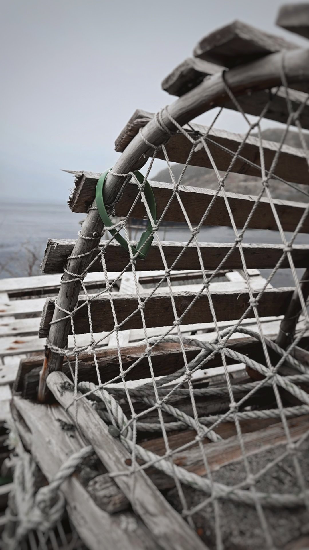 Lobster pots on shore.