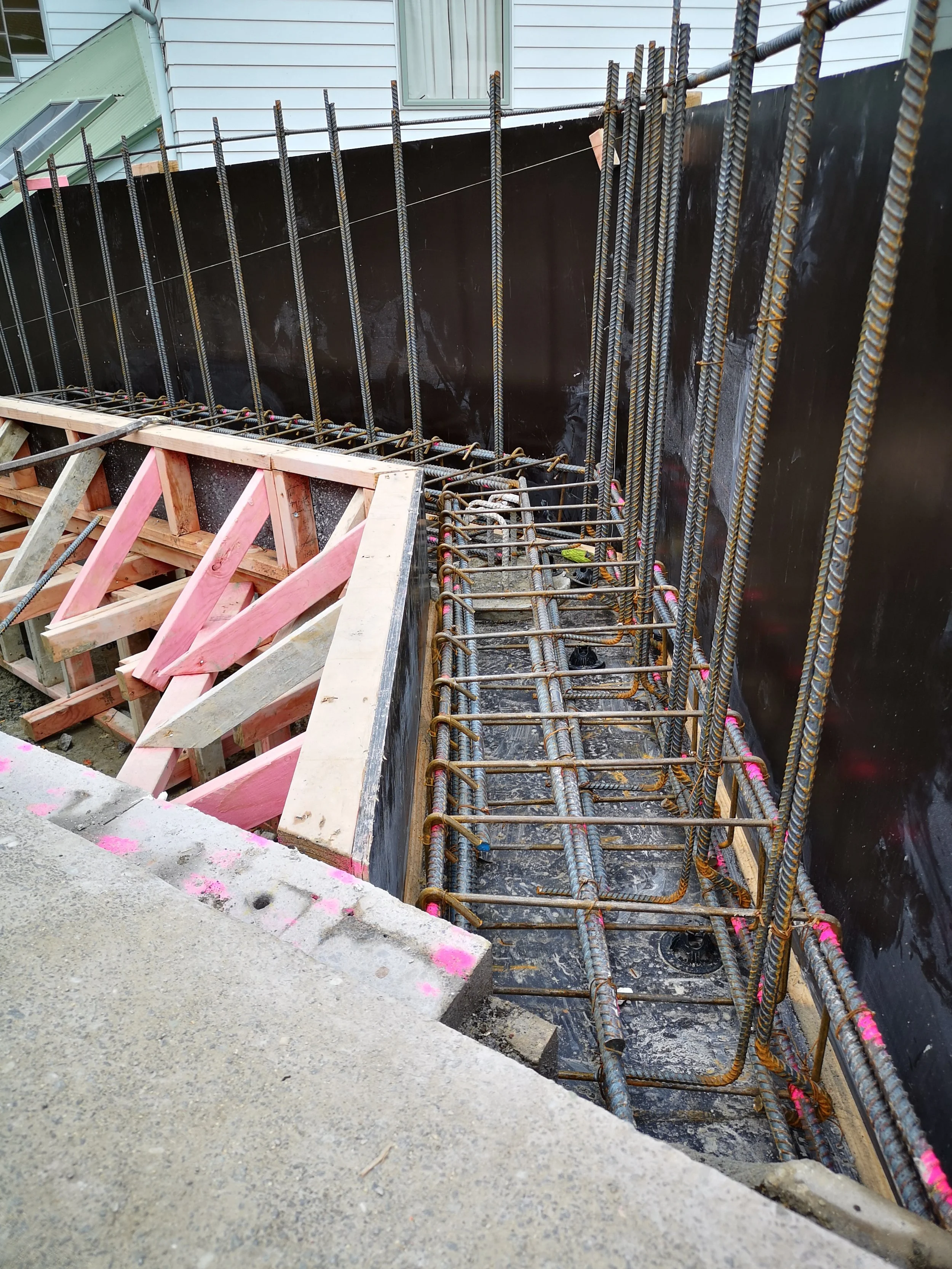 formwork and steel cages on a driveway extension in auckland