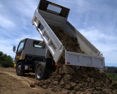 truck tipping spoil on Auckland residential earthworks site run by Oxen limited