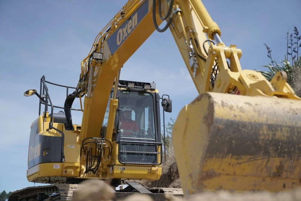 Oxen excavator doing earthworks on residential project