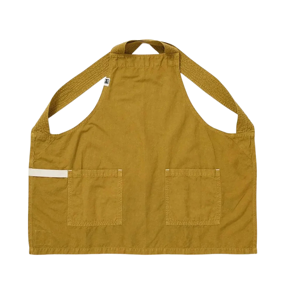 A mustard yellow bib apron with two front pockets and fabric straps.