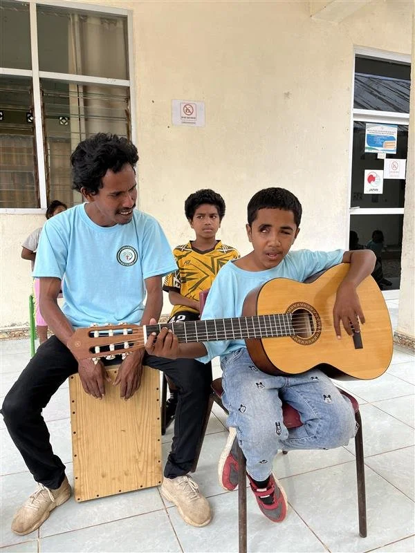 Students "jam" out to music during their down time