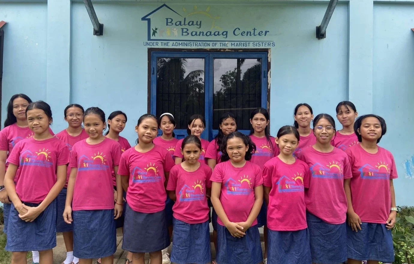 Young girls at Balay Banaag, outside the centre entrance- Philippines