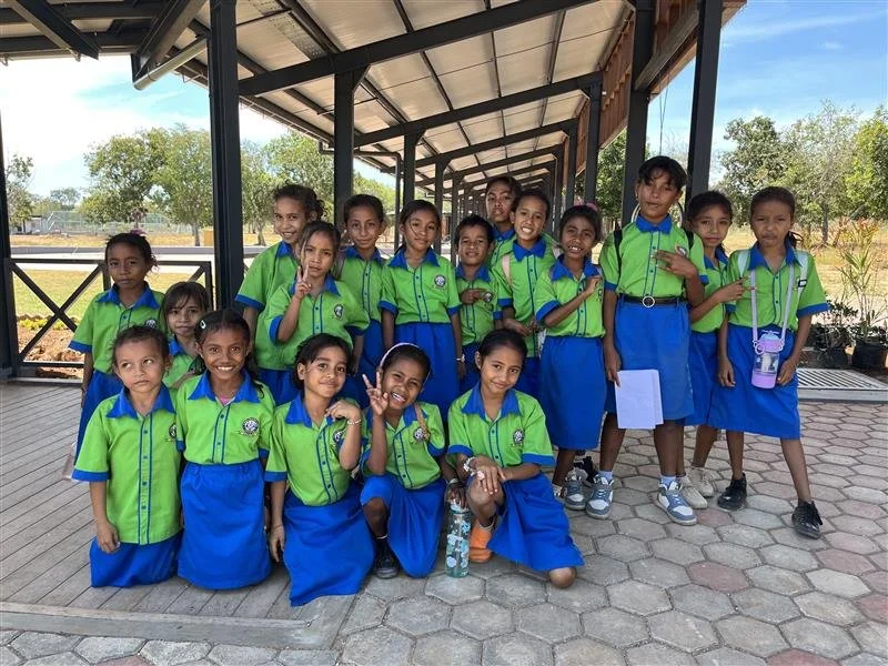 Student's pose for the camera at Marist College Lautem which opened its doors at their new campus in July 2025