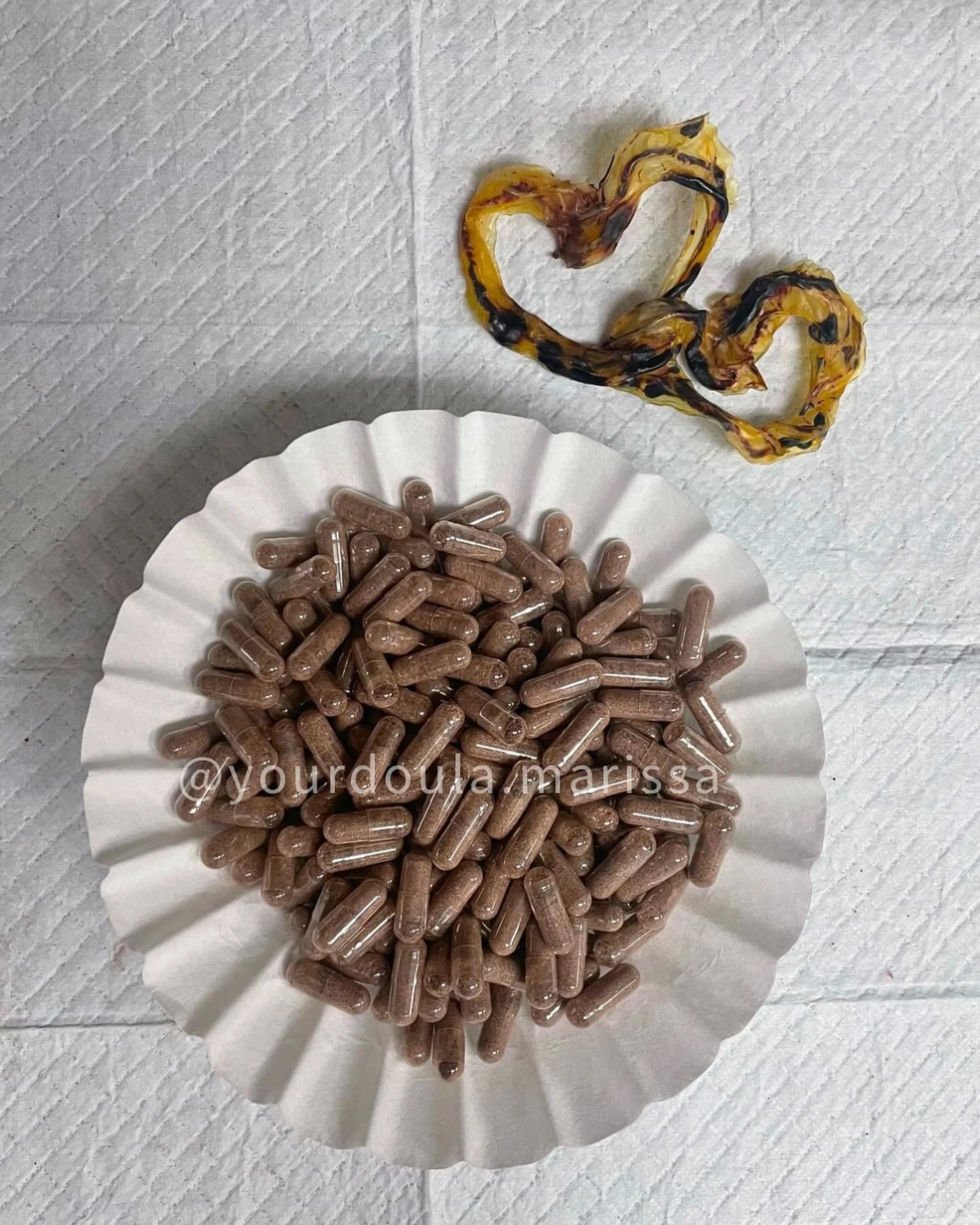 You are looking at 254 placenta capsules! So many I had to use 2 containers. 

This placenta was average circumference wise, but she was thick! Processed raw with minimal shrinkage, these will last my client past 6 weeks postpartum. I&rsquo;m so exci