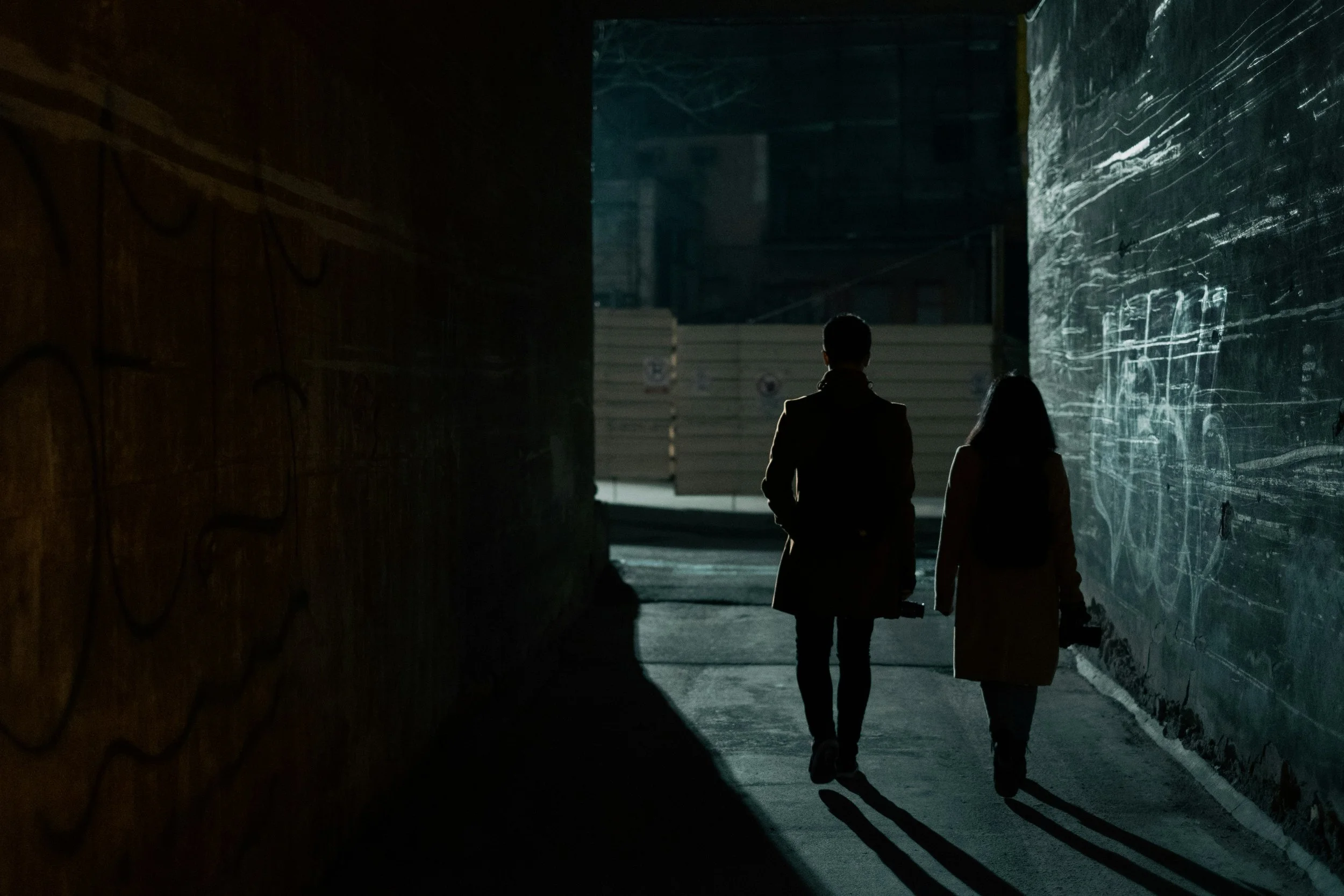 Person sitting alone feeling conflicted about unhealthy relationship