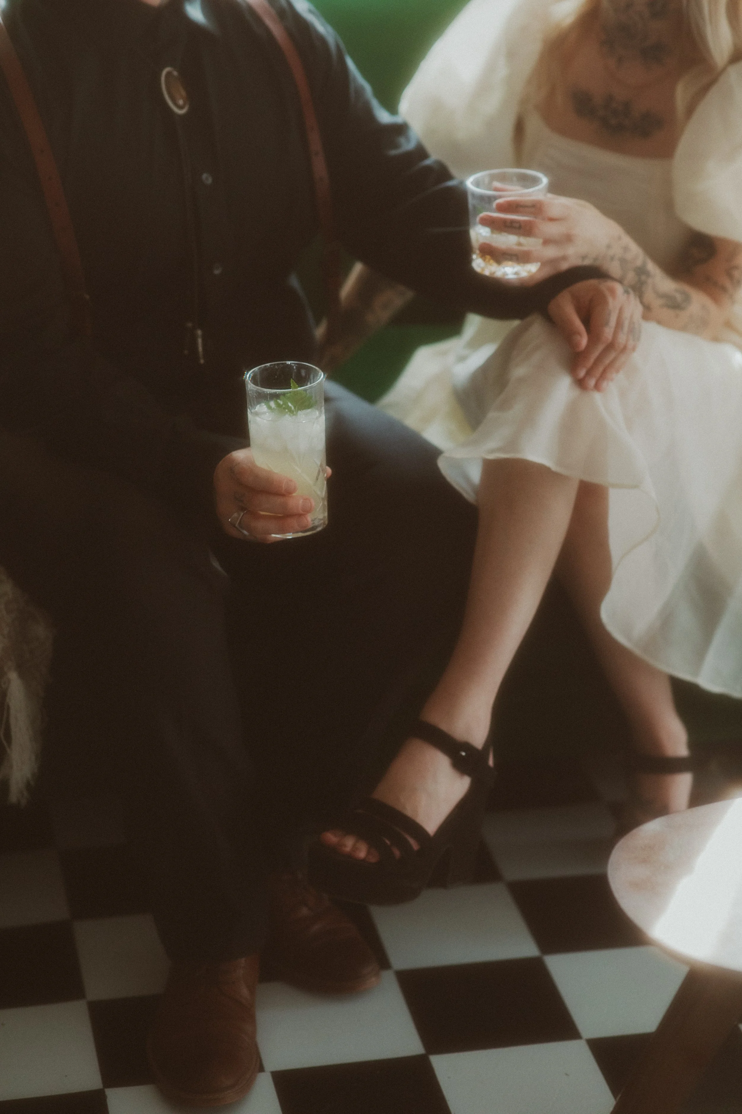 Couple sharing a toast during an intimate elopement celebration