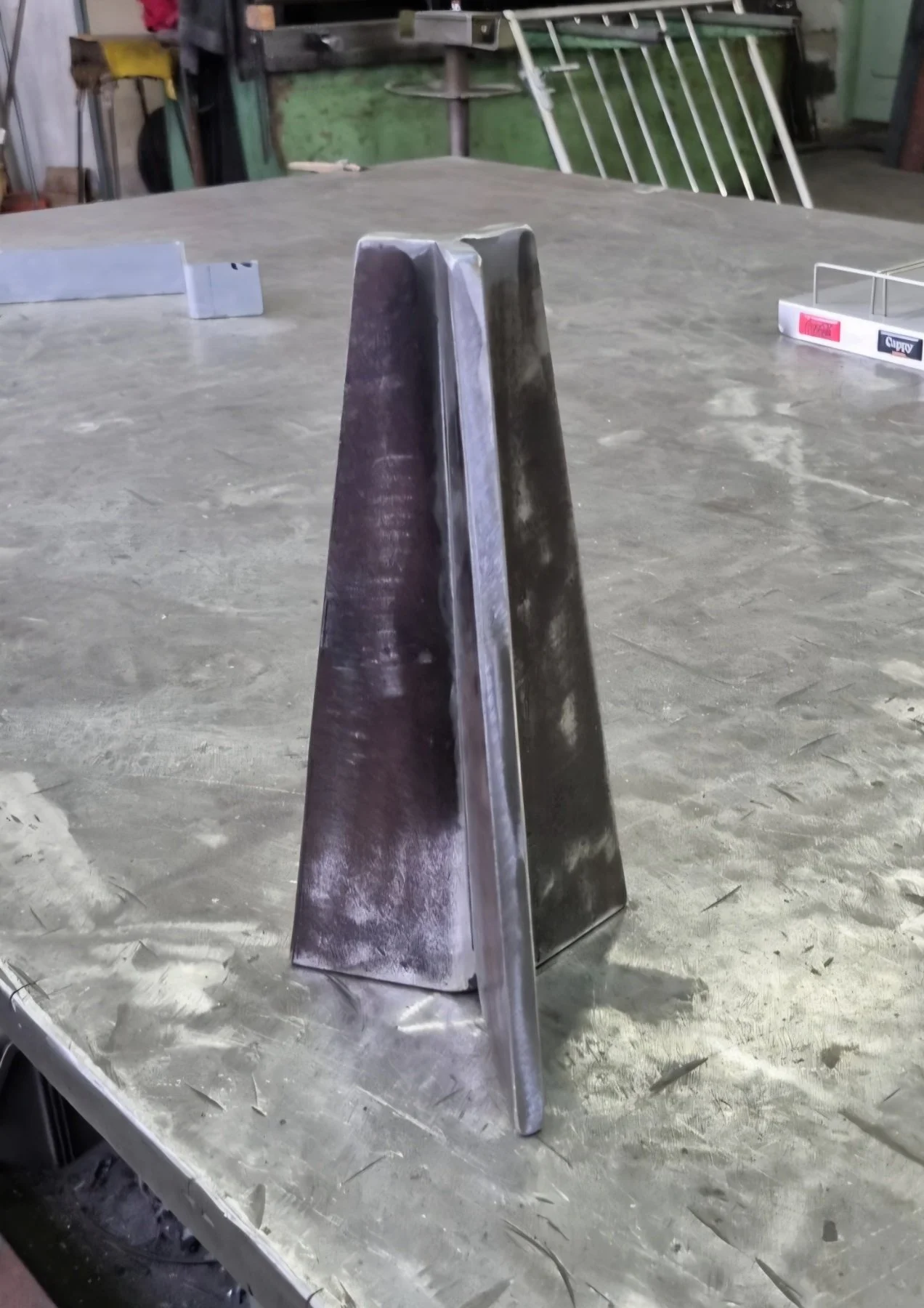 "Steel base component for the Echo lamp, SILENCE collection, in production at the Ebba Design workshop"