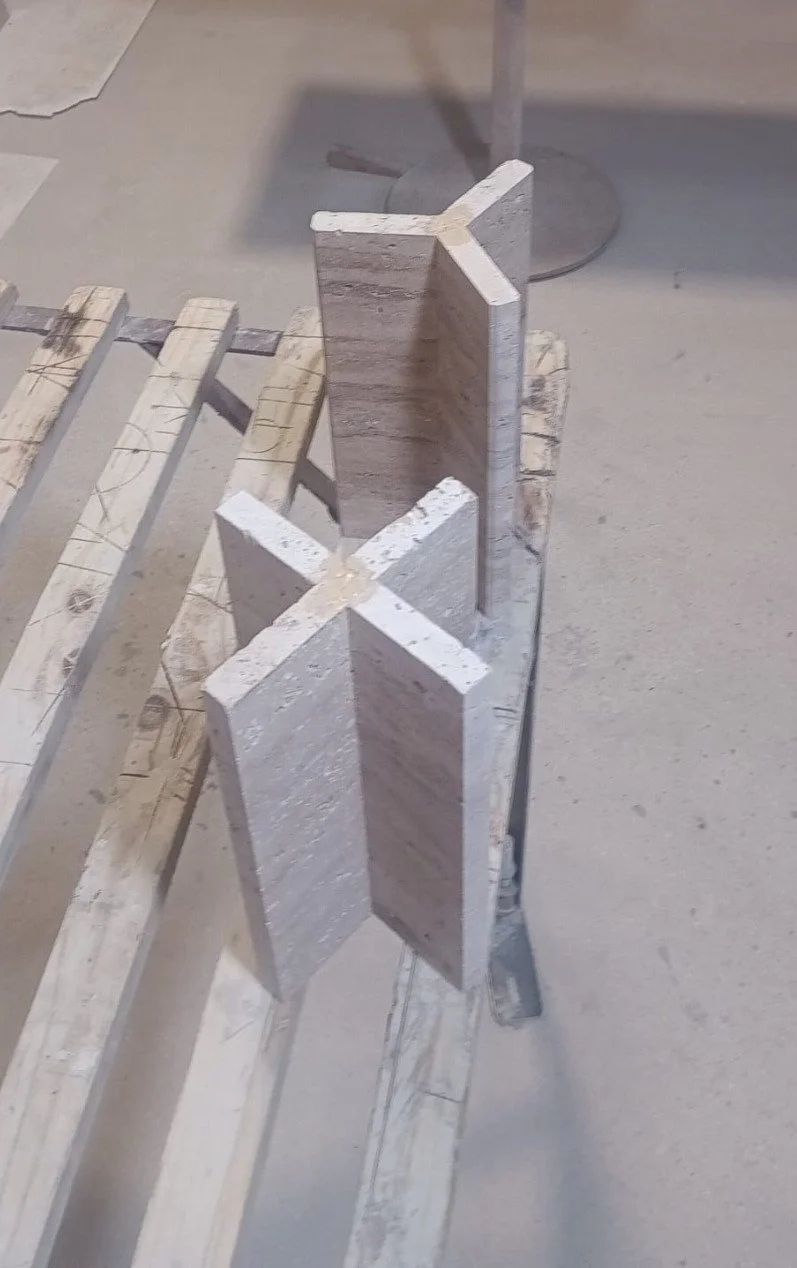 Travertine cut, shaped and refined by hand — each piece prepared with care before it becomes part of an Ebba lamp. From raw stone to a finished surface, the process is slow and exact.
