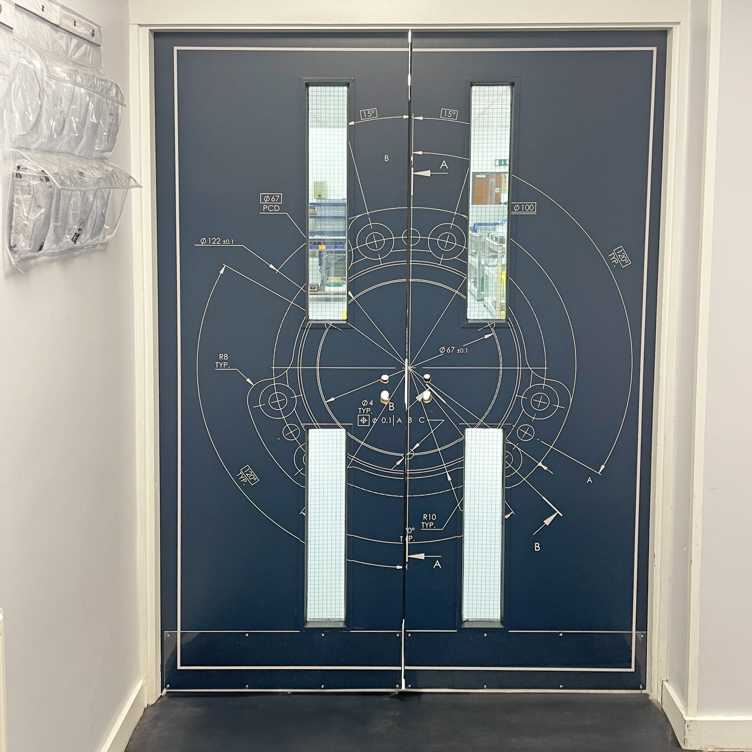 Boring doors no more! 🪄 Safety doors like this are important for regulations and costly to replace, 💸despite their value, their fading beauty meant something needed to be done. The solution was to wrap them! They are now bang on brand, and more bea