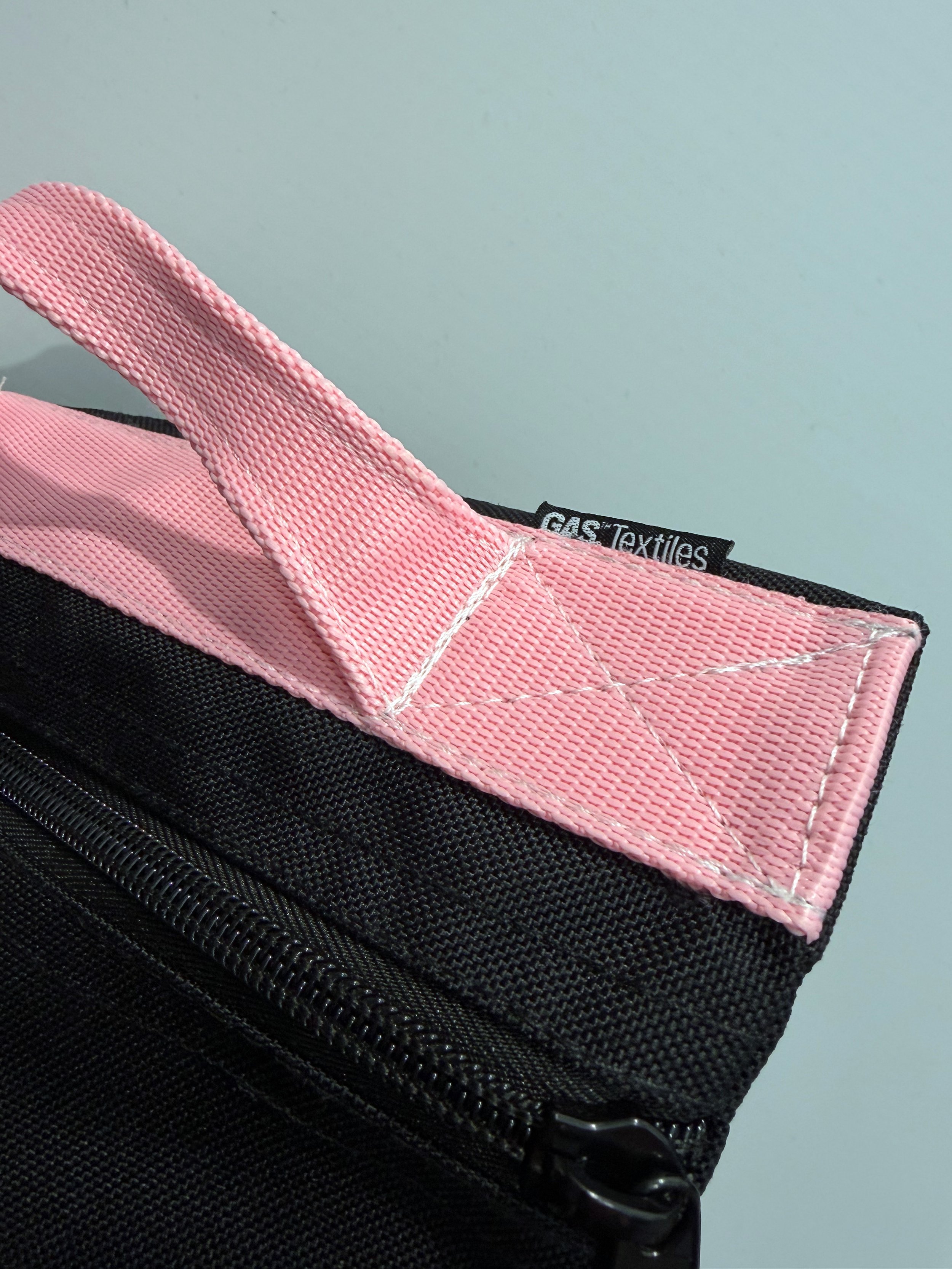 Custom-made black 1000D nylon, durable sandbags for photography with zipper closures and pink webbing handles