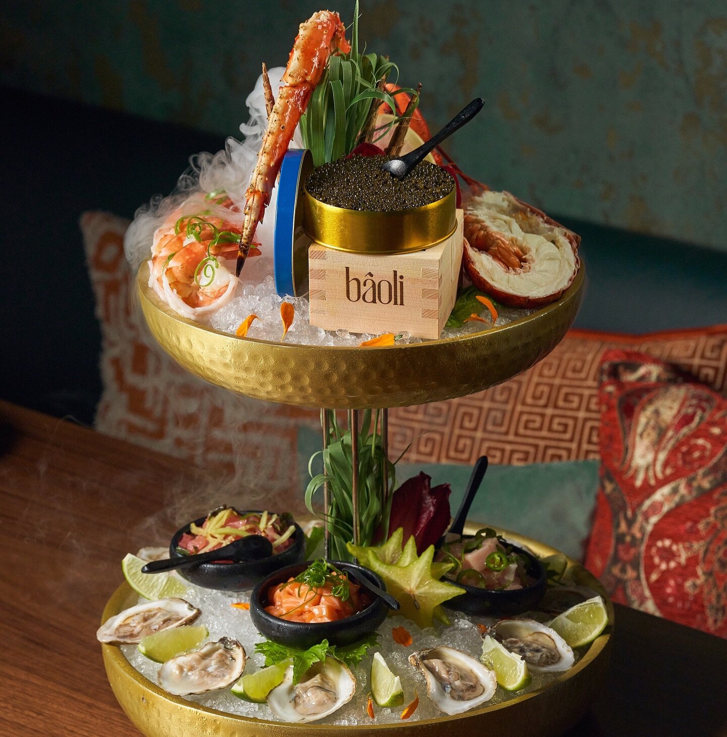 Rise above the ordinary with our luxurious Seafood Tower. #BAOLImiami