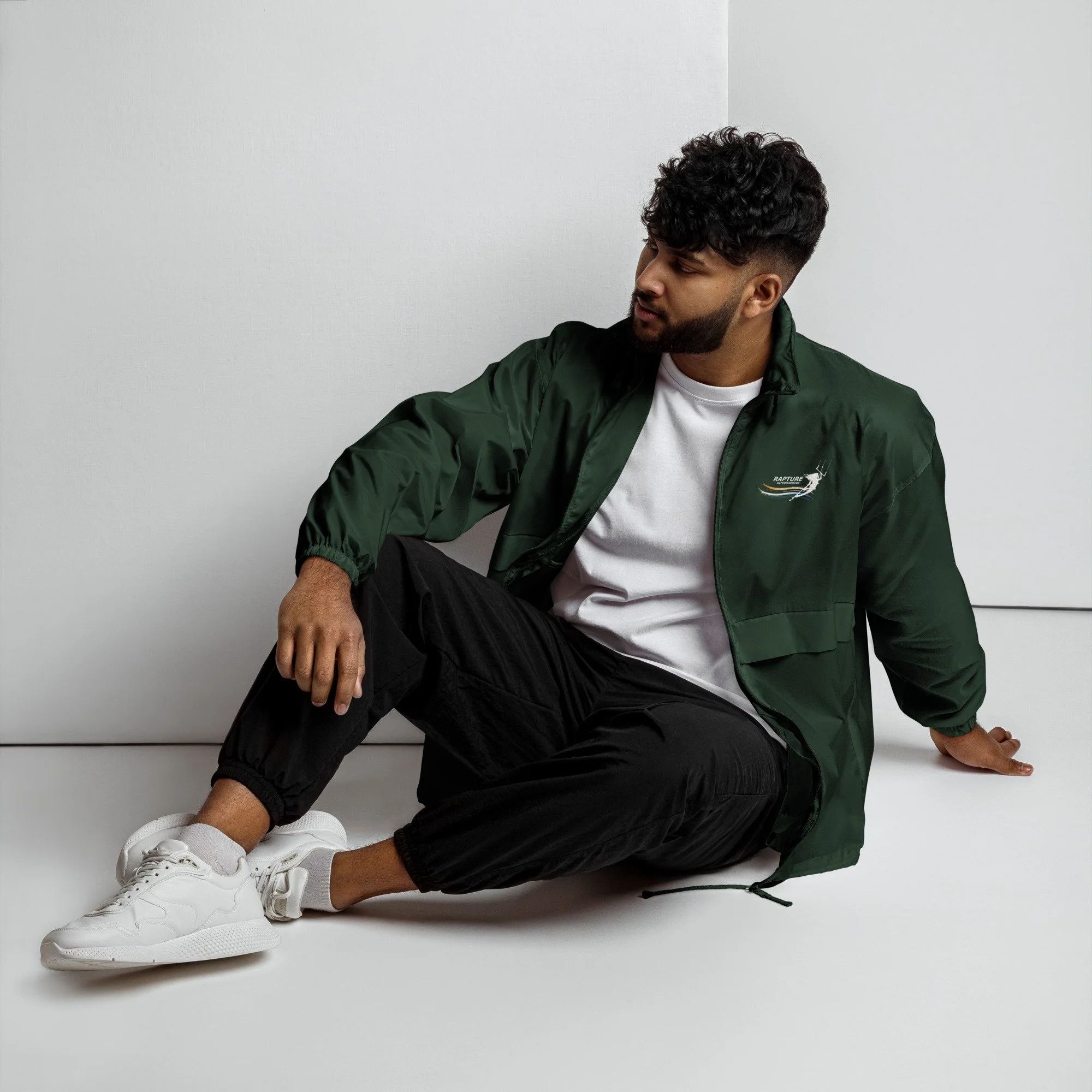basic-unisex-windbreaker-forest-green-front-689976a55c0eb.jpg