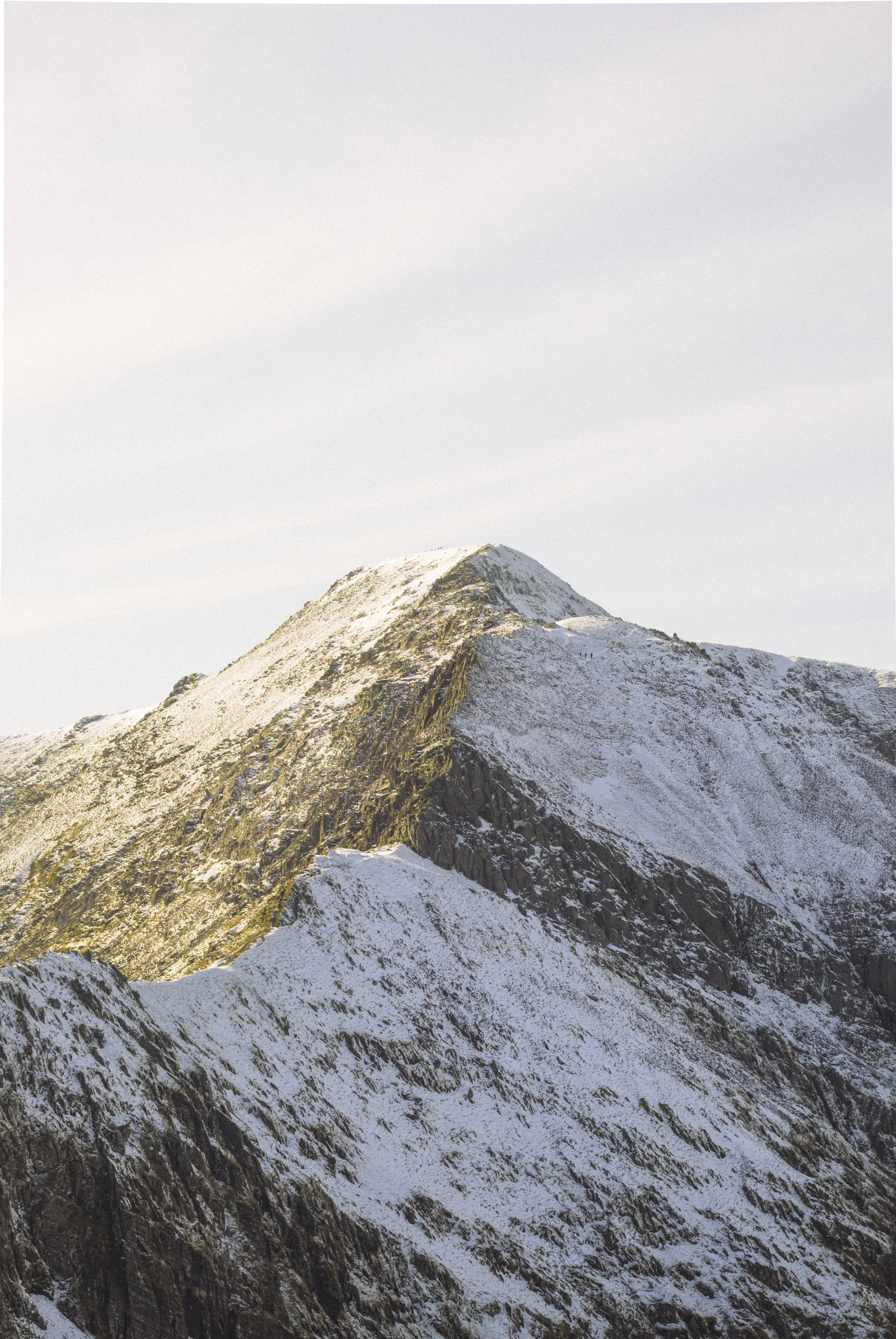 Snow-capped mountain peak.