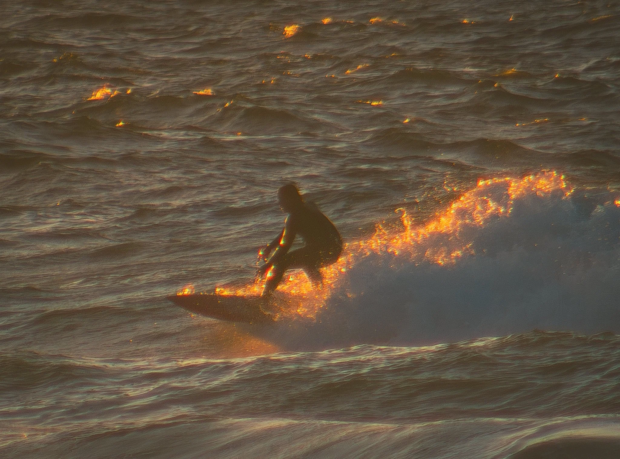 Surfer hitting the waves in St Ives. 