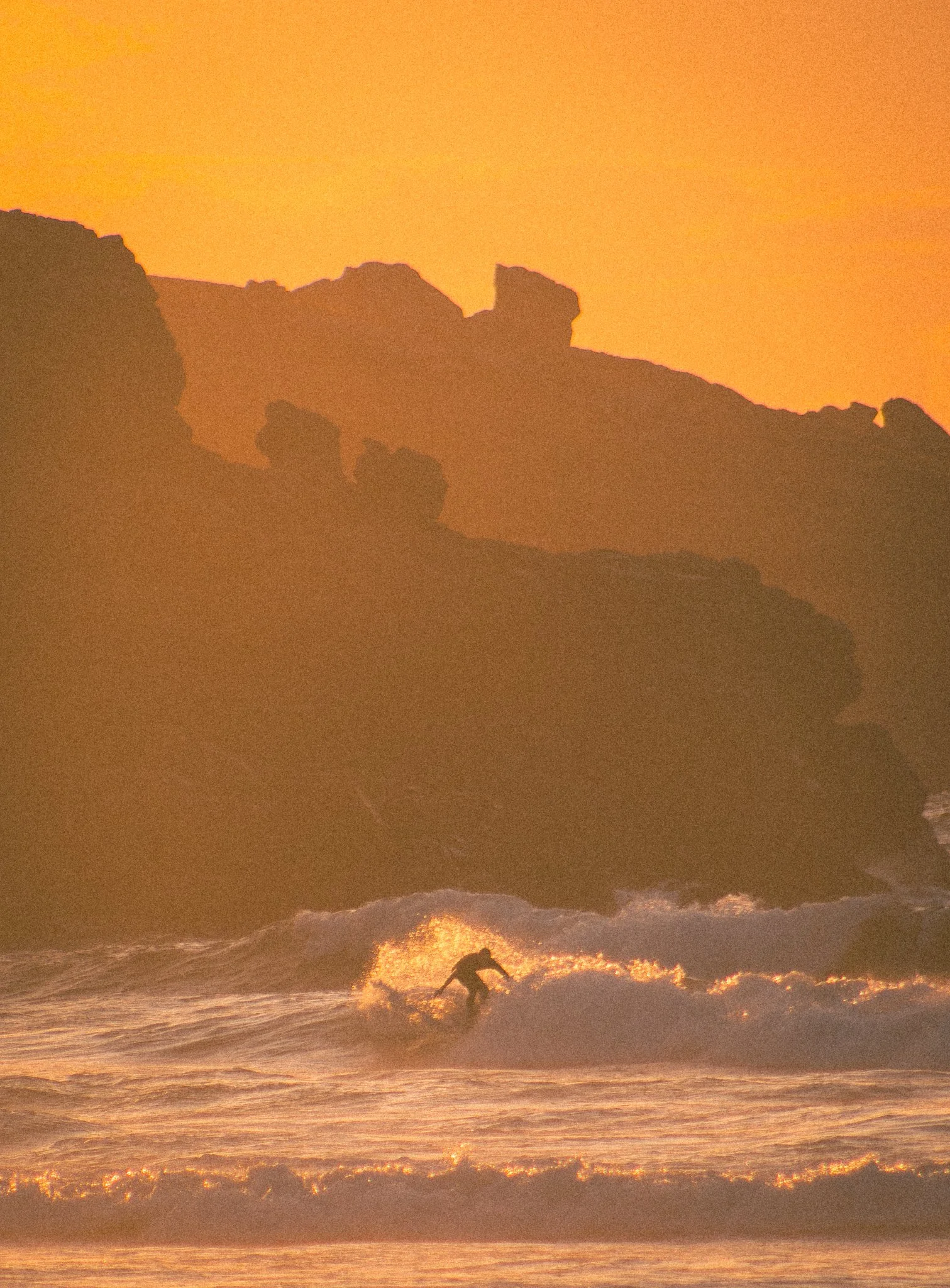	
Surfer hitting the waves in St Ives.