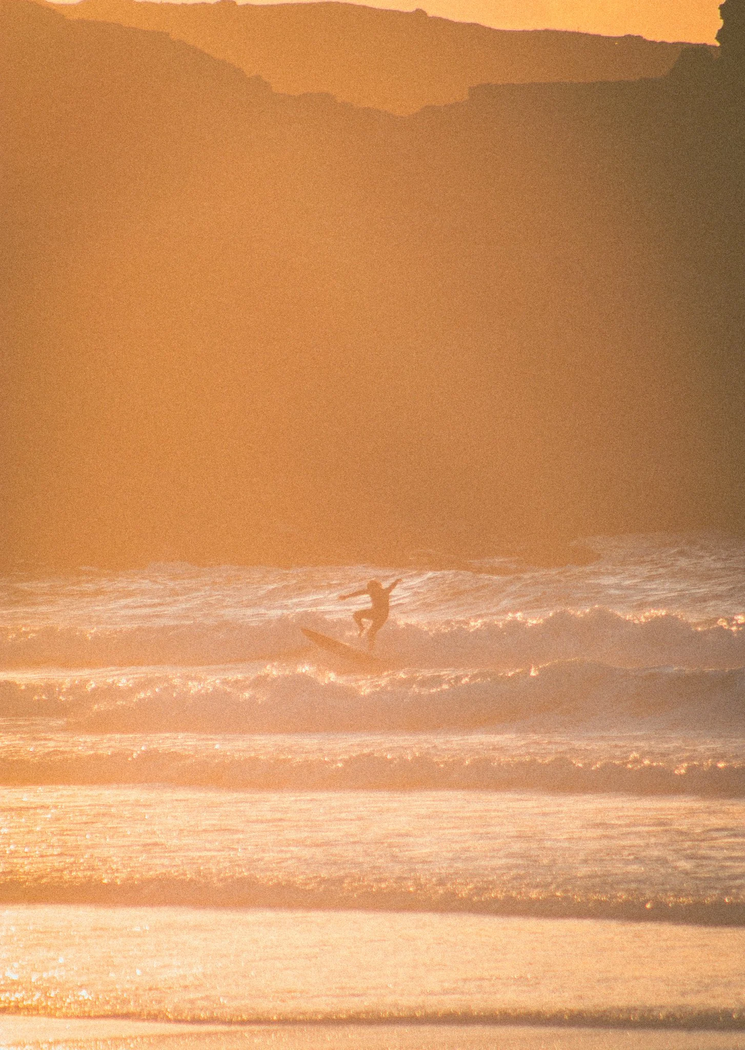 	
Surfer hitting the waves in St Ives.