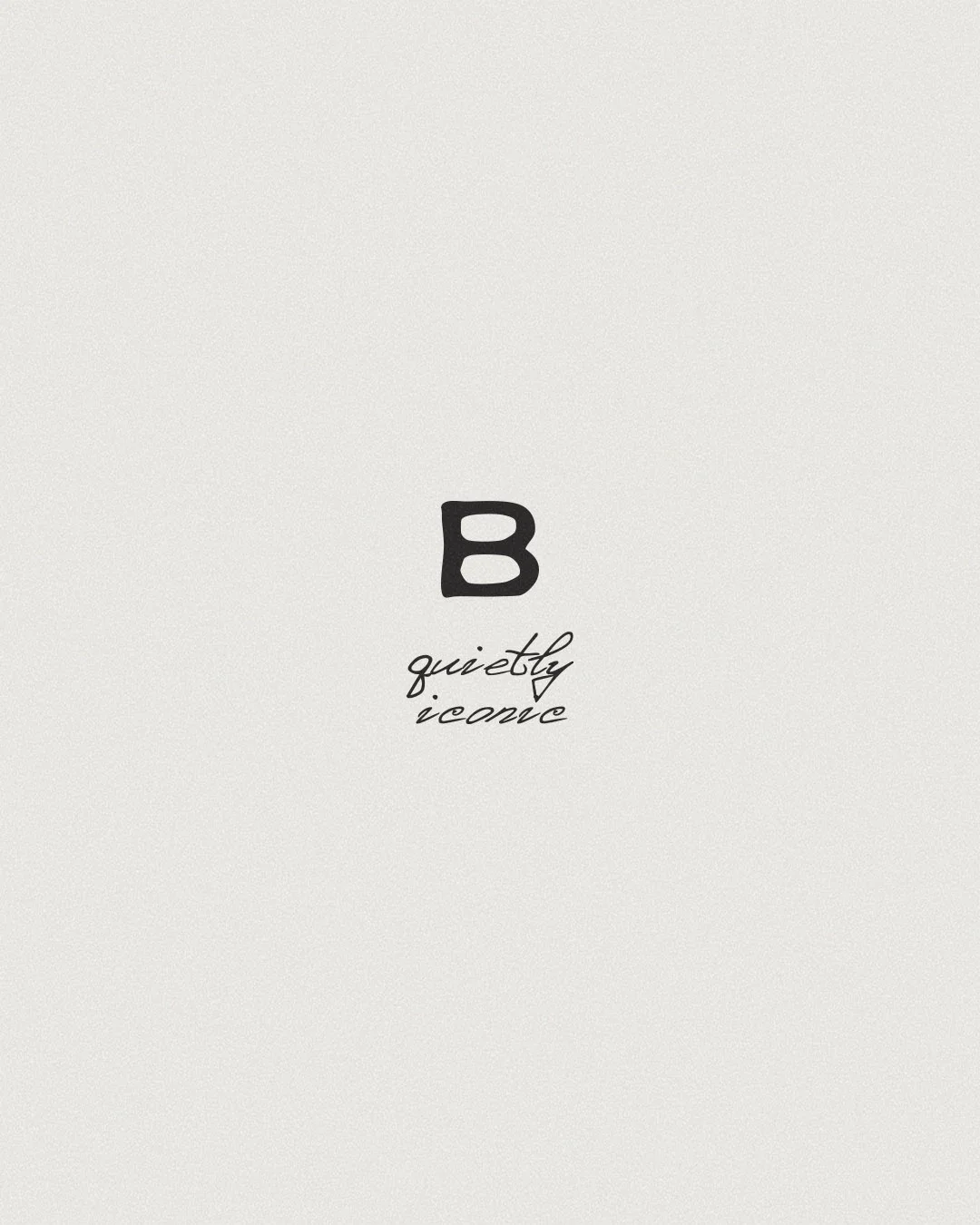 Minimalistic design featuring a large black letter 'B' in the center, with the words 'quietly iconic' written below in a cursive font.