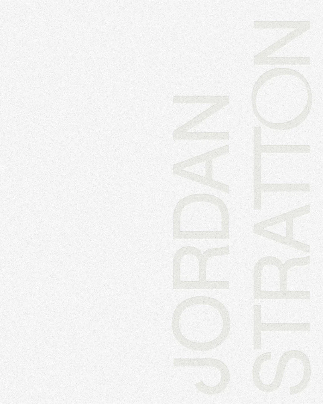 A white background with the text 'JORDAN STRATTON' written in large light gray letters.