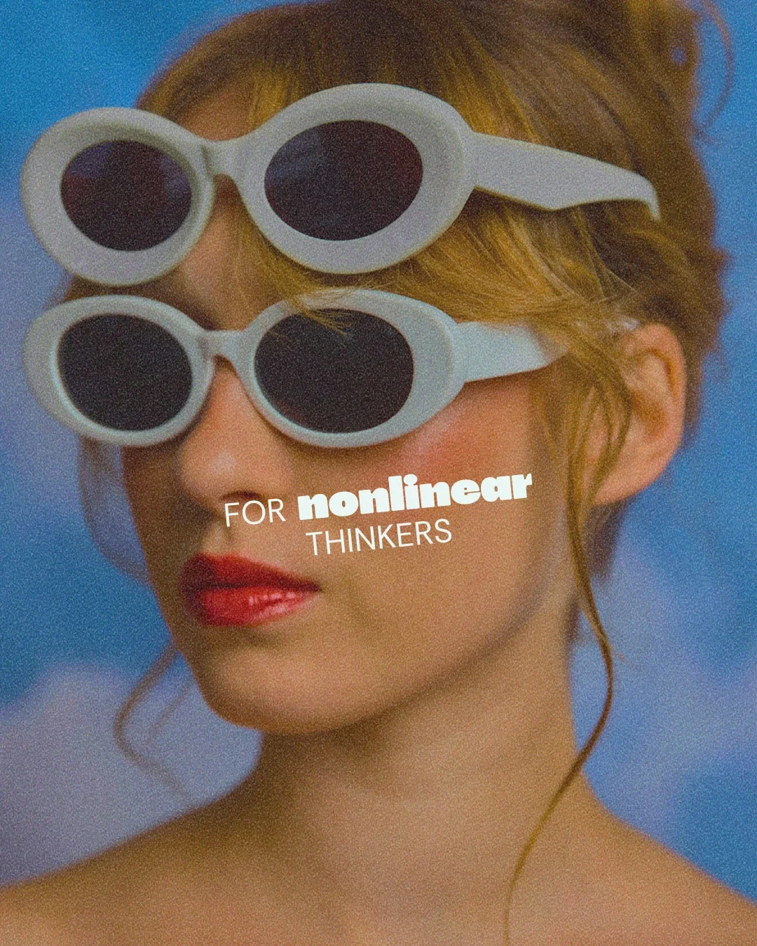 A person wearing fake white sunglasses with dark lenses, with the face turned slightly to the left. The background is blurred with blue tones. Text overlay reads "FOR nonlinear THINKERS."