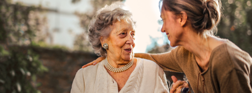 An older couple sharing a quiet moment during their relocation, highlighting the peace of mind that comes with professional move management.