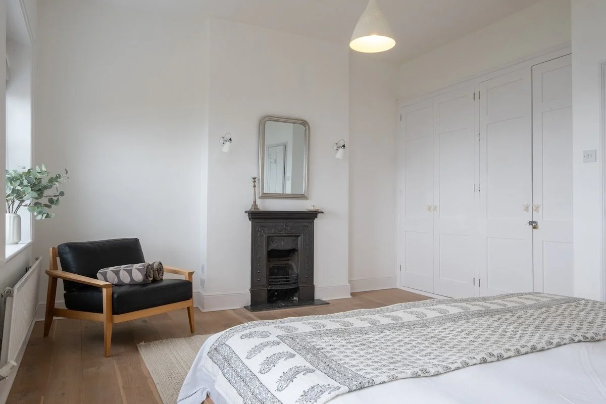 Devonshire Terrace hostd  bed and chair.jpeg