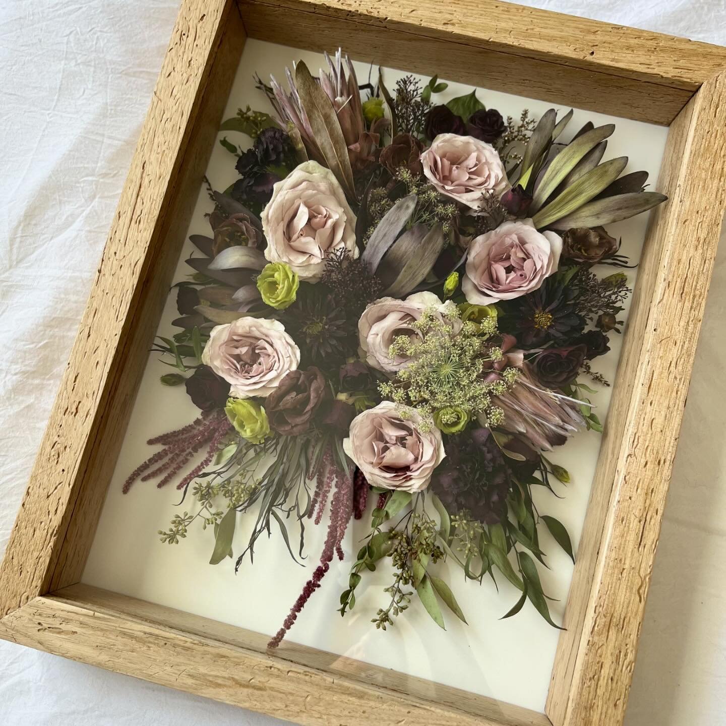 Kelsey&rsquo;s bouquet was full of so many gorgeous unique blooms. Those protea, leucadendron, &amp; amaranthus were so much fun to work with! @acanthusfloral does absolutely incredible work. 

Kelsey wanted to include her husband&rsquo;s boutonniere