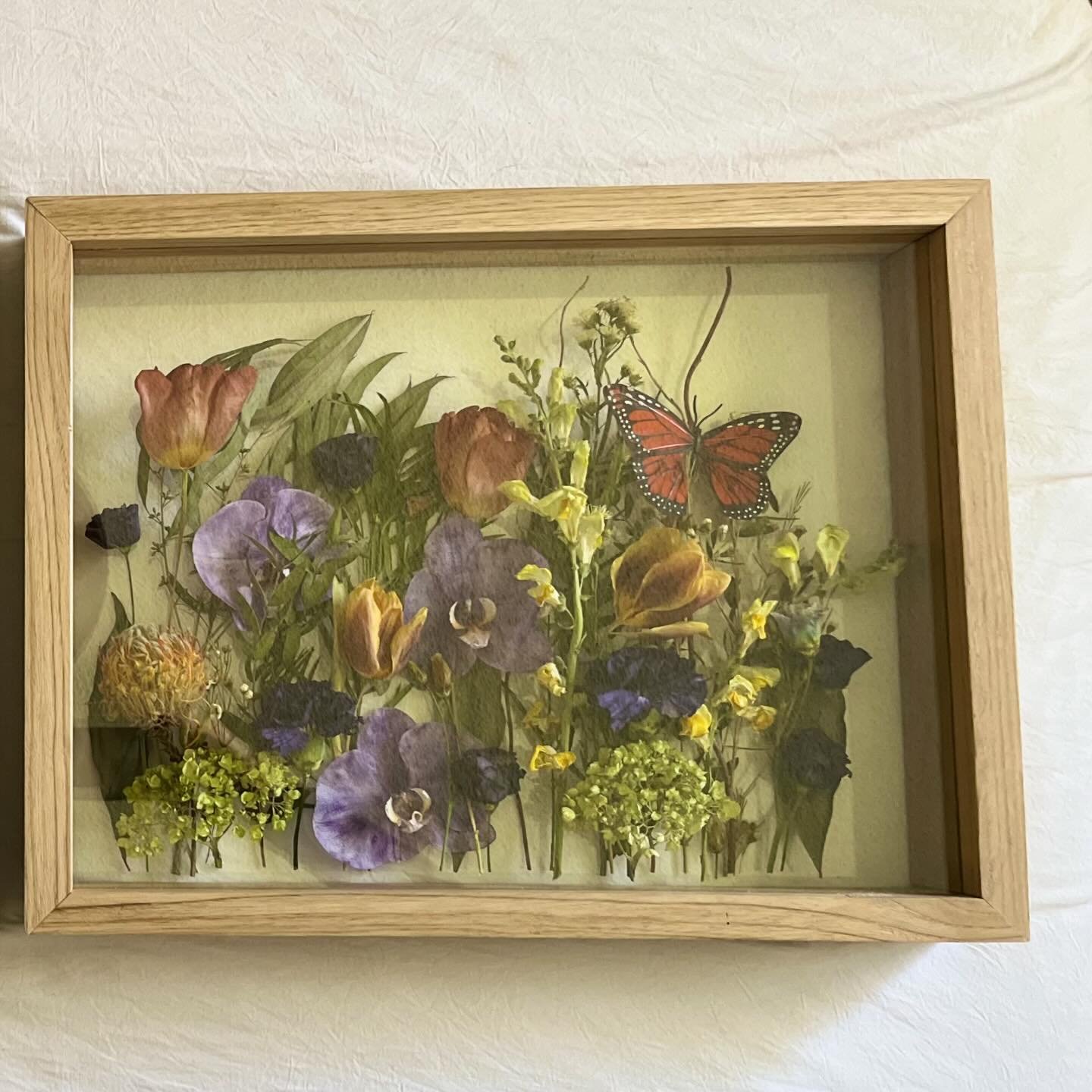 A beautiful garden style set to remember a very special person. 🦋

14x18&rdquo; butternut finish shadowbox with glass backer