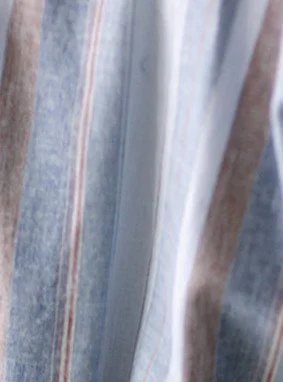 Current soft striped fabric in cotton linen blend, 60% cotton and 40% linen, breathable natural textile handcrafted into luxury pajamas and loungewear on Bowen Island