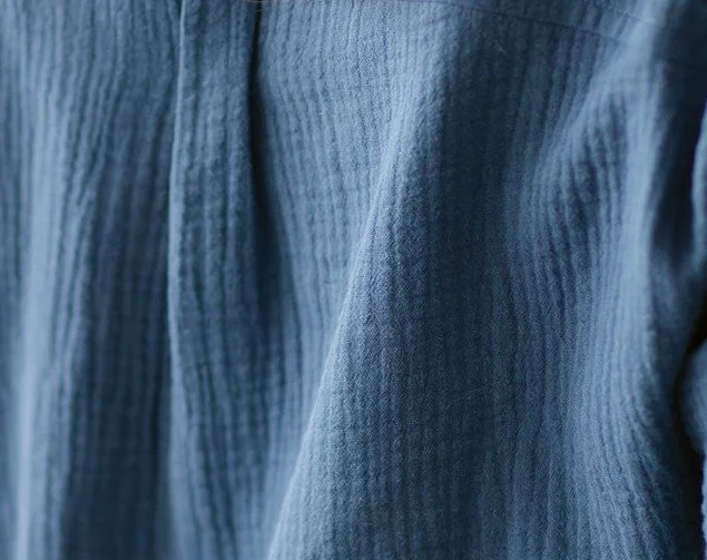 Still Blue deep blue fabric in 100% organic cotton, soft breathable sustainable natural textile handcrafted into luxury pajamas on Bowen Island