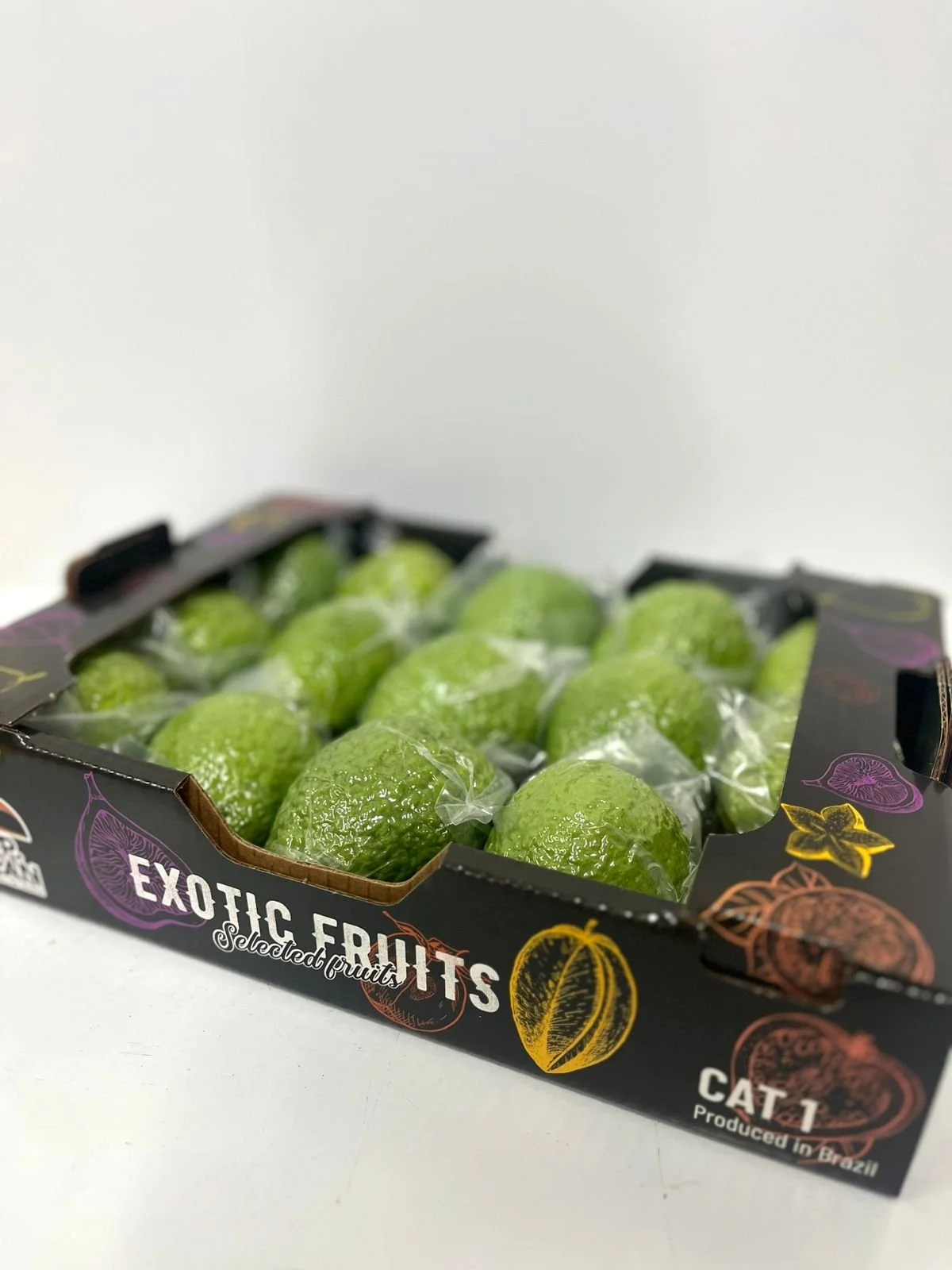 black tropcan 'Exotic Fruits' box with guavas