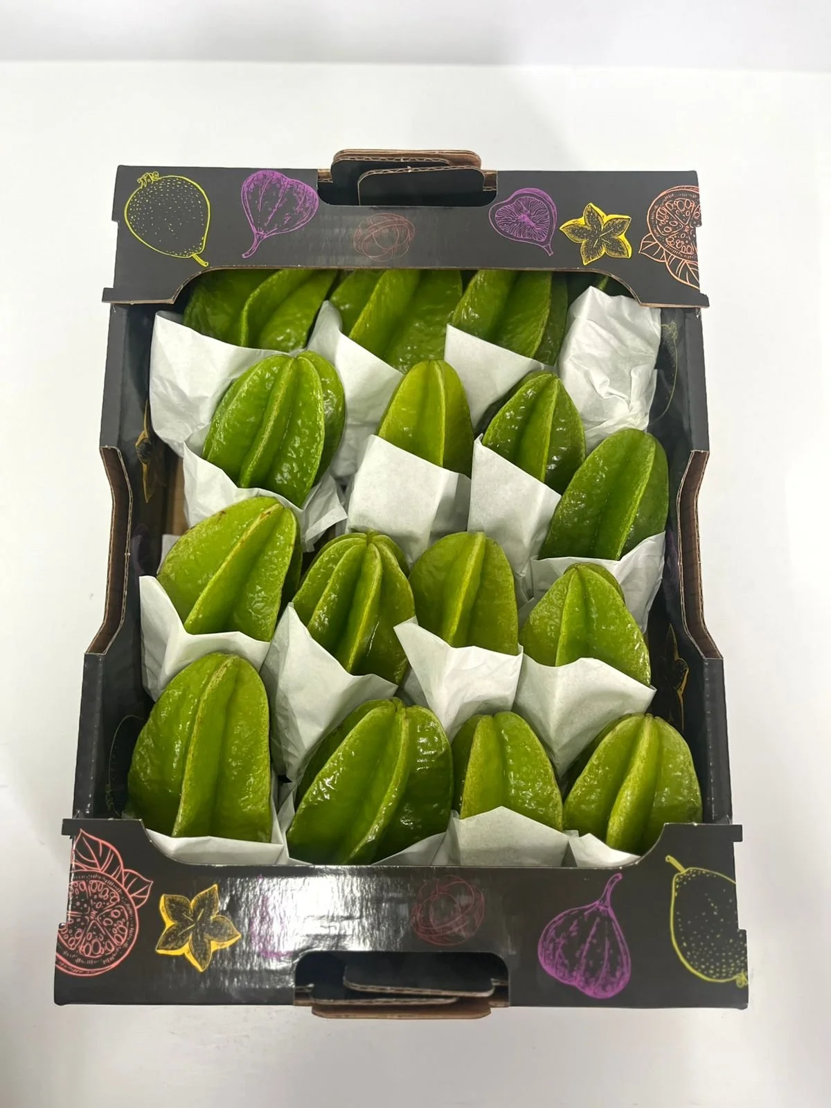 tropcan black exotic fruits box packed with starfruits