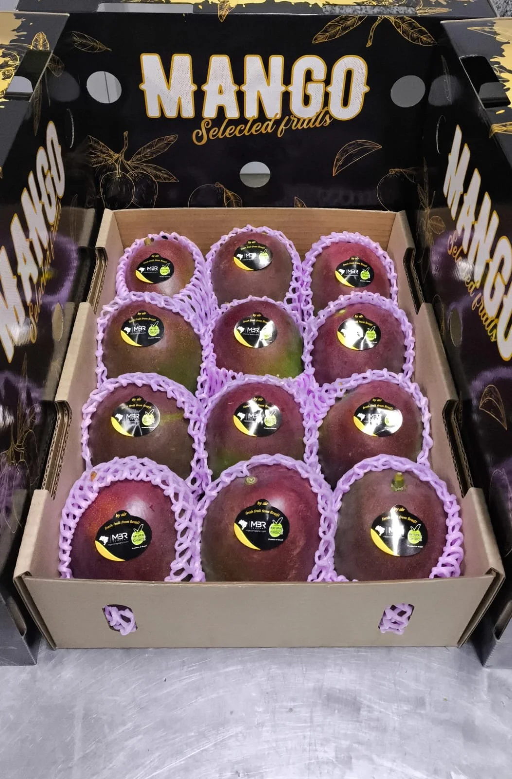 mbr tropcan mango gold and black box with kent mangoes ready to export, with mbr natural choice sticker.