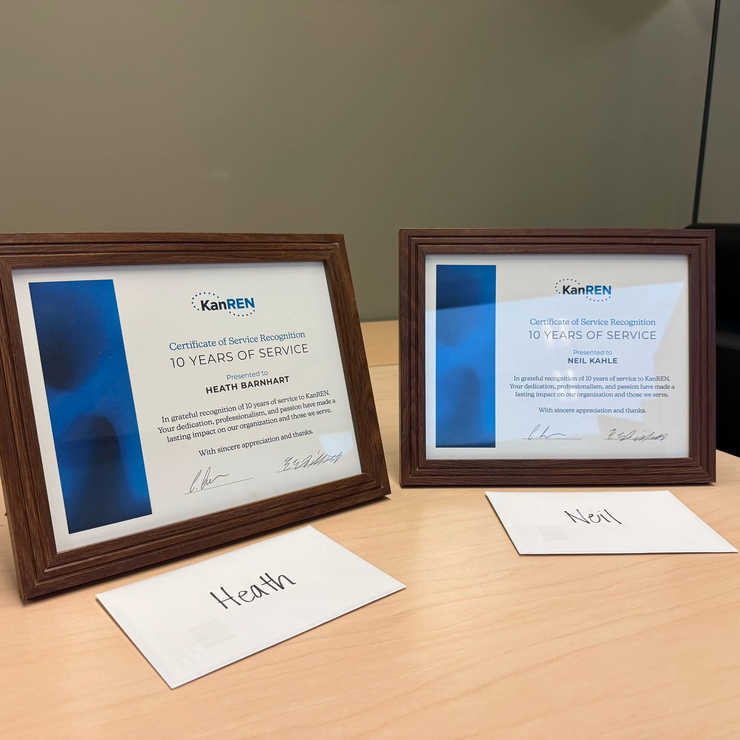 Celebrating 10 Years of Service: Honoring Neil Kahle and Heath Barnhart’s Impact at KanREN