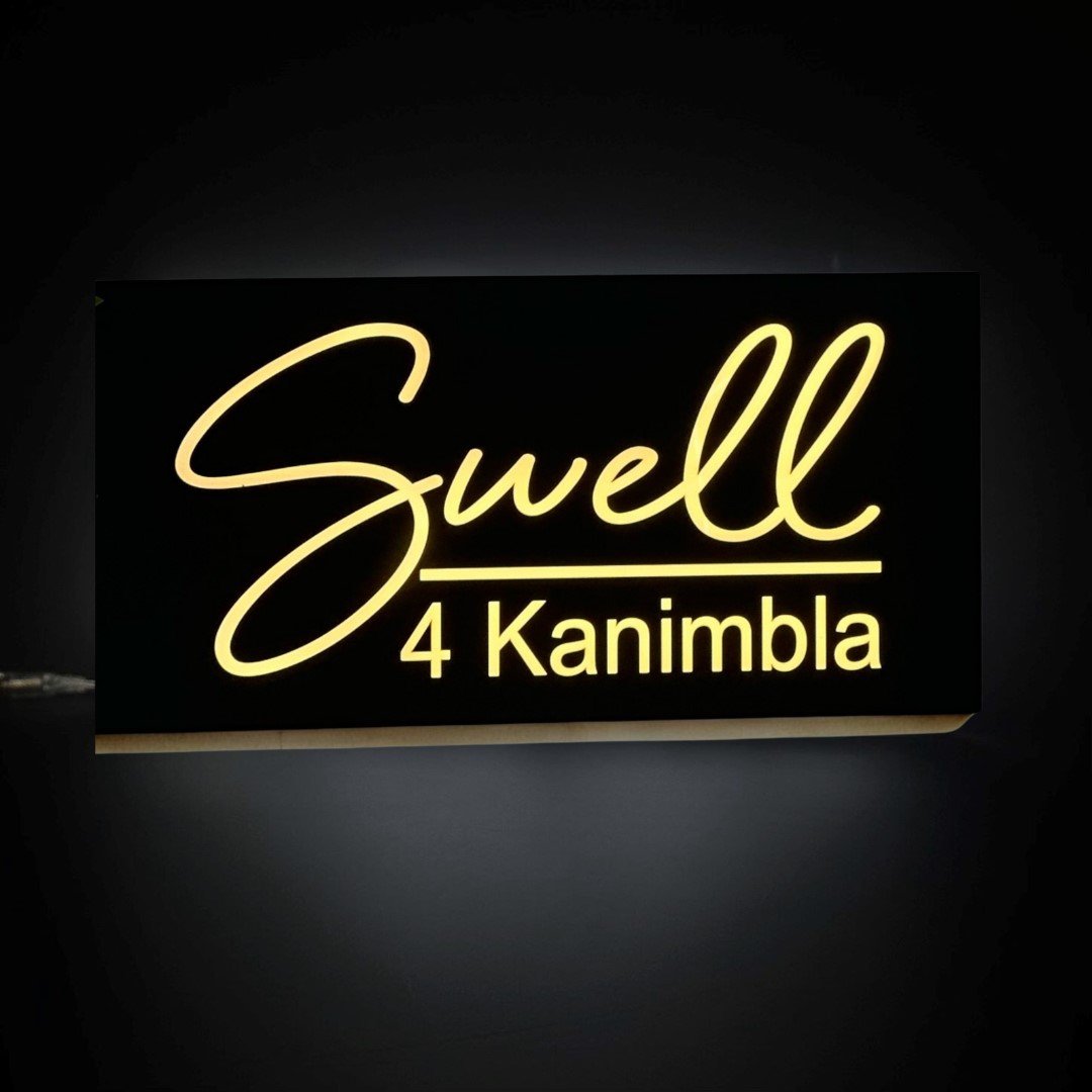 black-and-warm-white-illuminated-house-sign.jpg