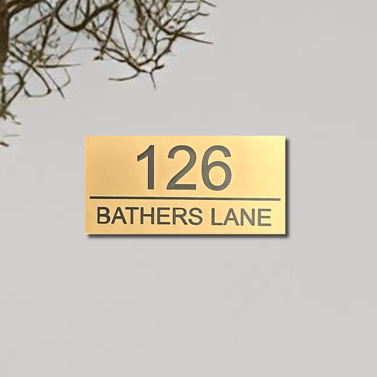 gold-on-black-bathers-plaque.jpg
