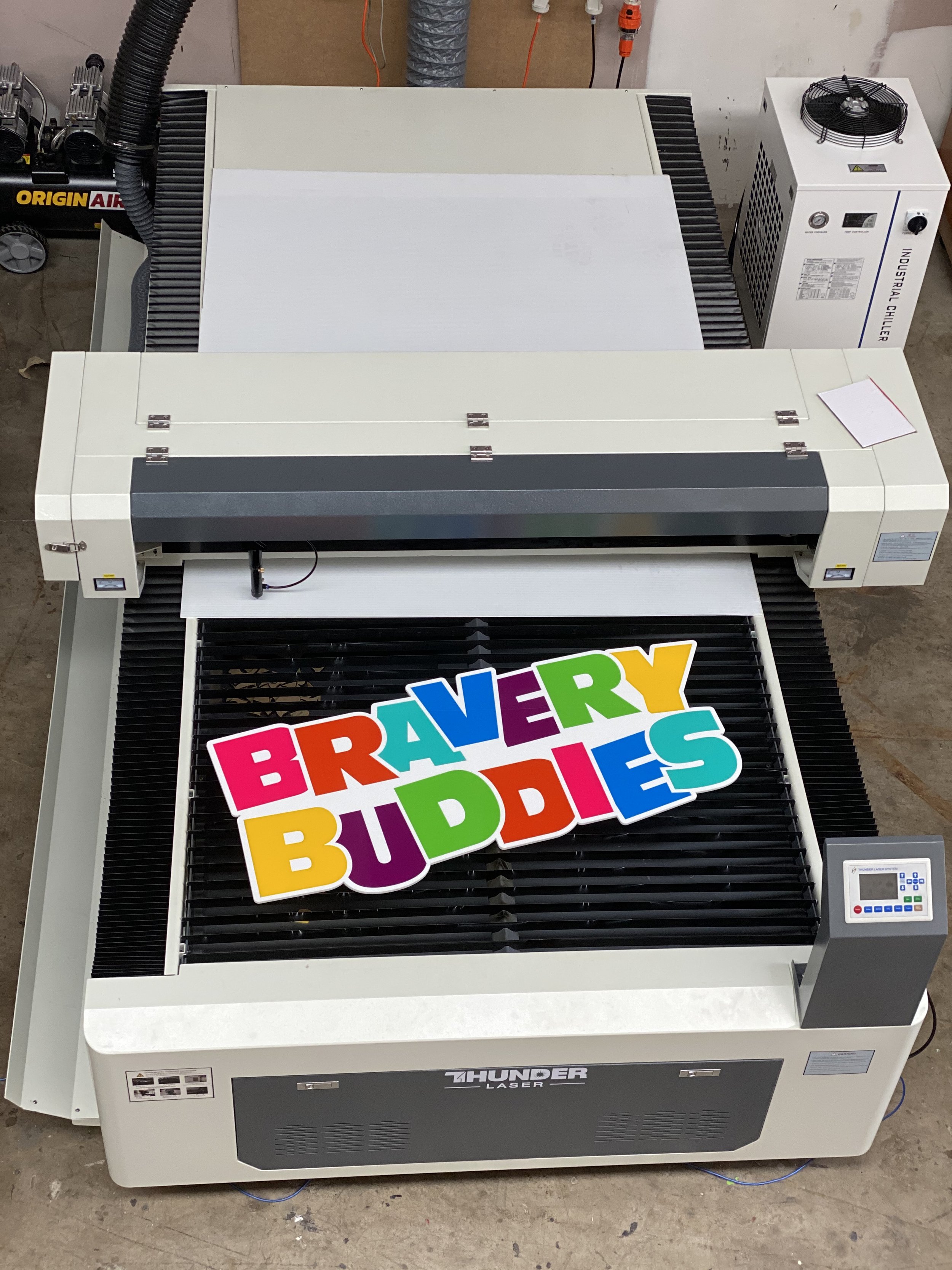 Bravery Bussies charity multi coloured inlayed acrylic logo sign