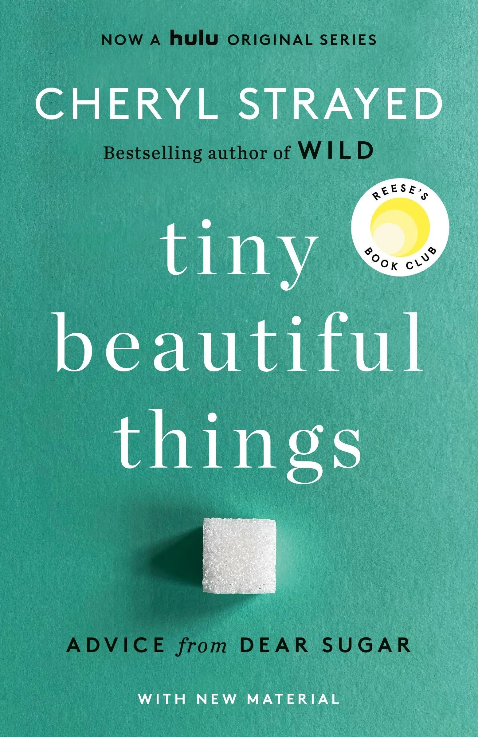 The book cover of "Tiny Beautiful Things" by Cheryl Strayed, featuring a turquoise background, white text, and a sugar cube casting a shadow.