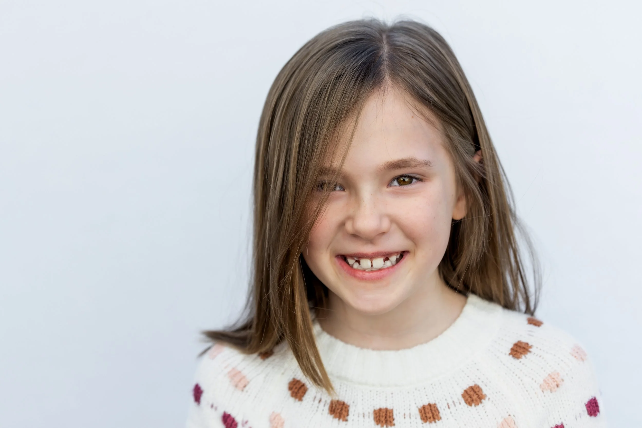 Fine are school portrait girl on white backdrop