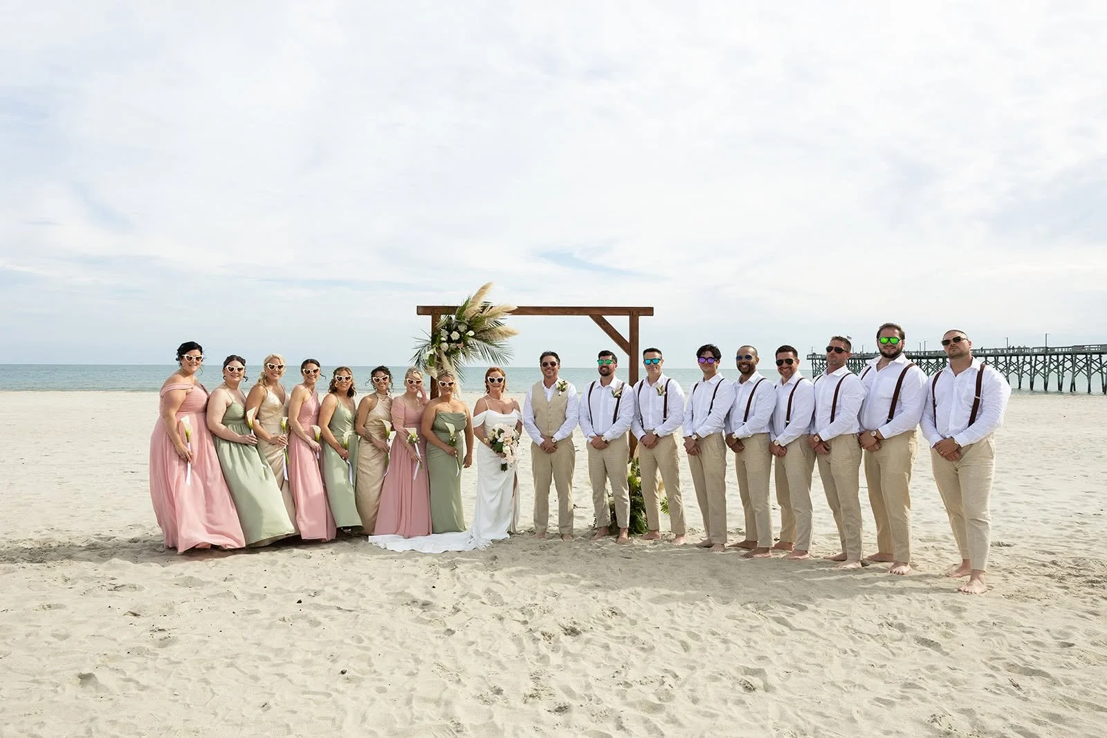 BridesMaids&GroomsonBeach.jpg