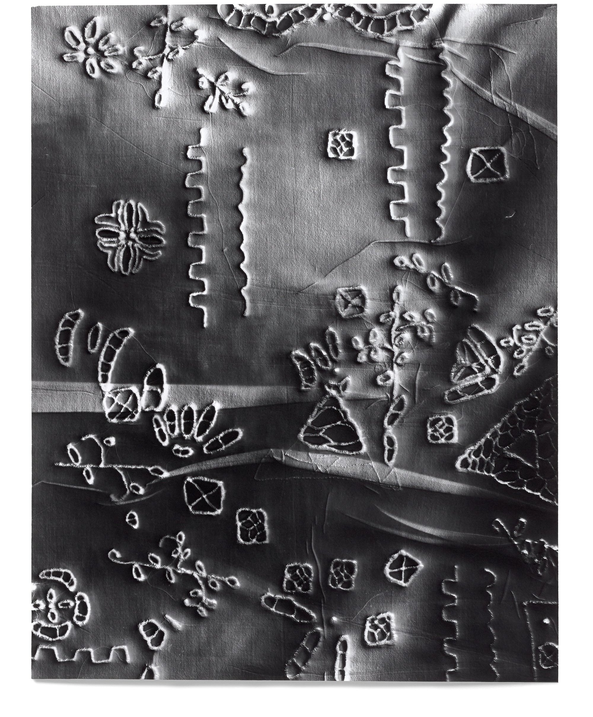   Anonymous 2,  2018 Photographic relief (embossed silver gelatin photogram) Impression of hand-embroidered cutwork sampler (United States, 1910s) 14 x 11 in 