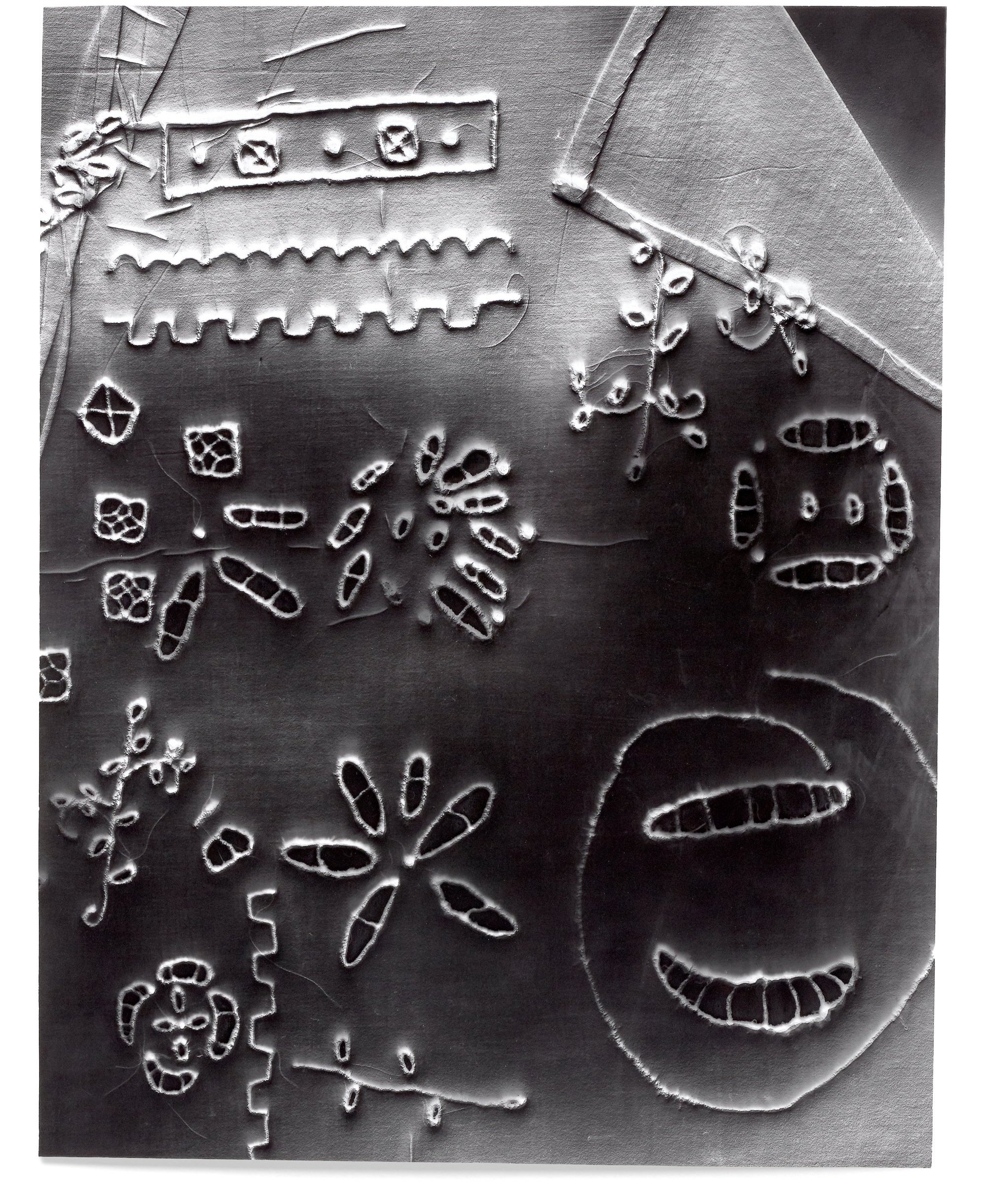   Anonymous 3,  2018 Photographic relief (embossed silver gelatin photogram) Impression of hand-embroidered cutwork sampler (United States, 1910s) 14 x 12 in 