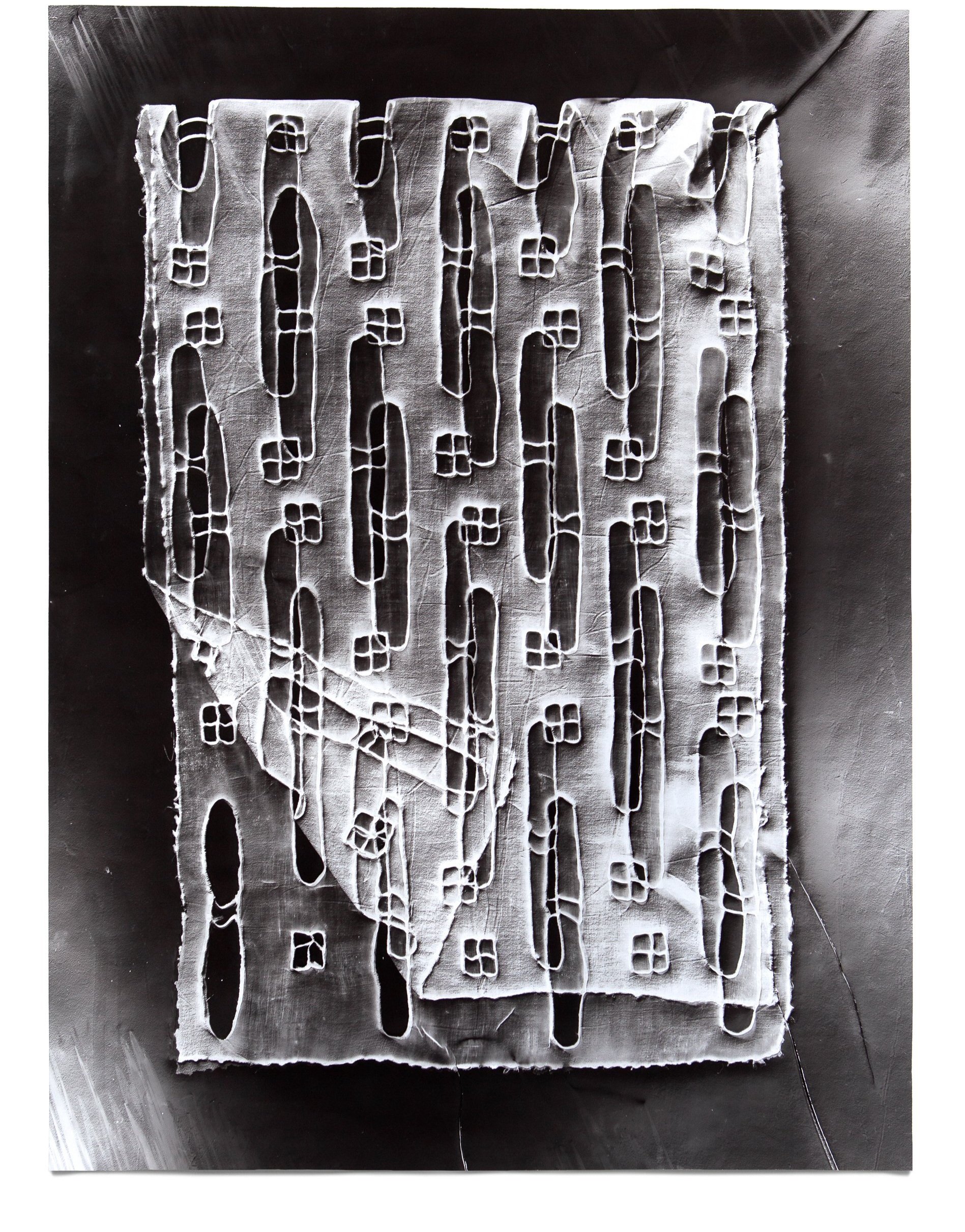   Codex 1,  2019 Photographic relief (embossed silver gelatin photogram) Impression of hand-embroidered cutwork fabric (France, 1920s) 19 x 14 in 