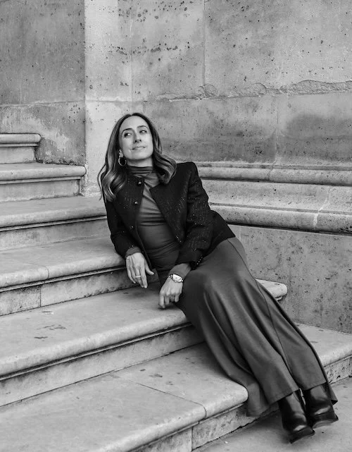 Woman sitting on steps