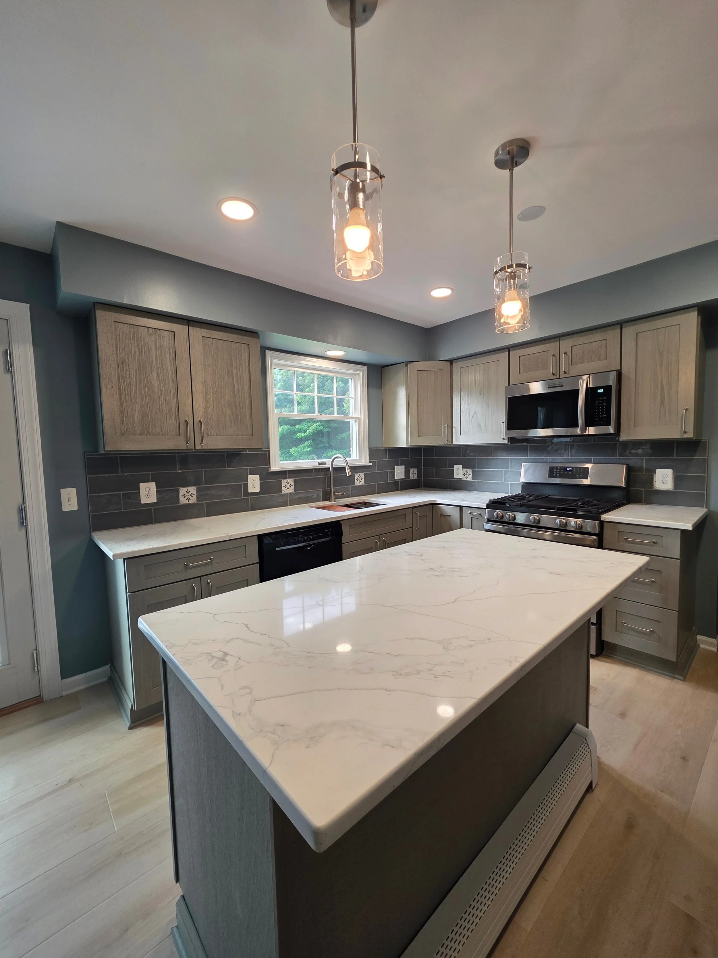 Kitchen island overlooking the range and sink.