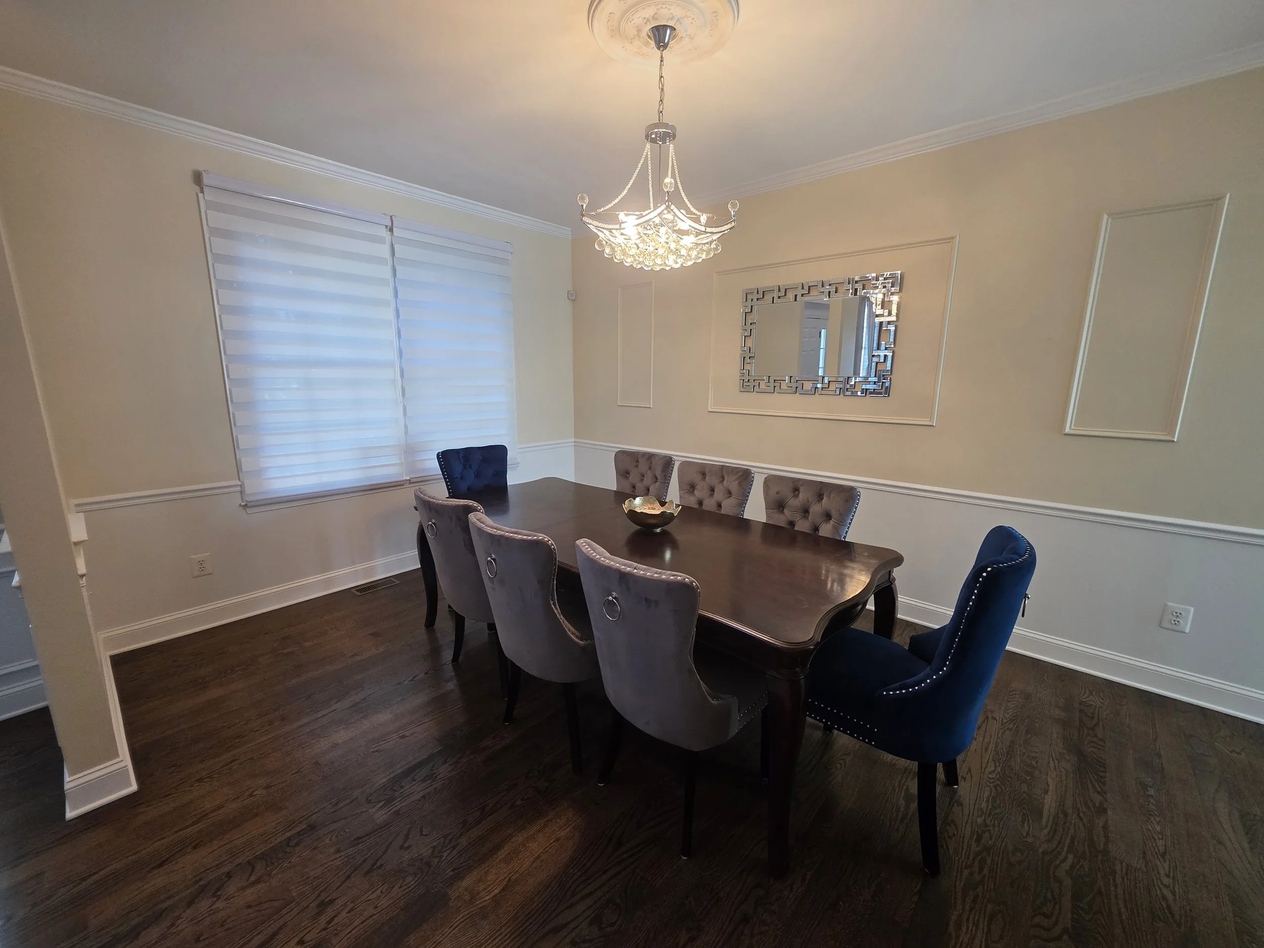 Dining room walls and decorative molding after painting.