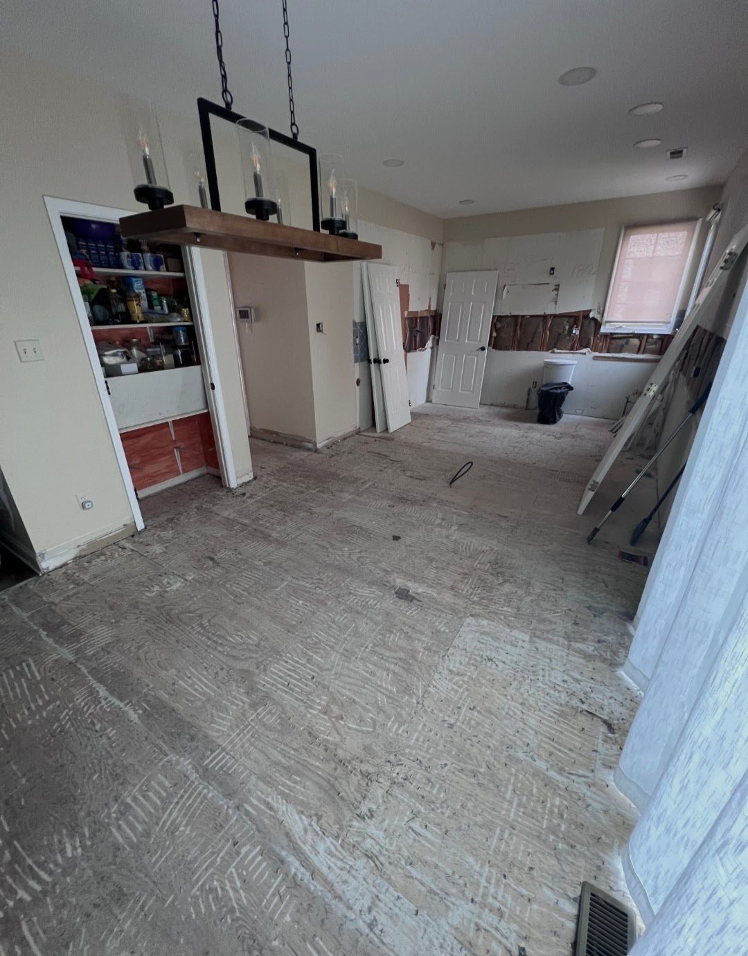 Kitchen during renovation before new cabinetry and finishes.