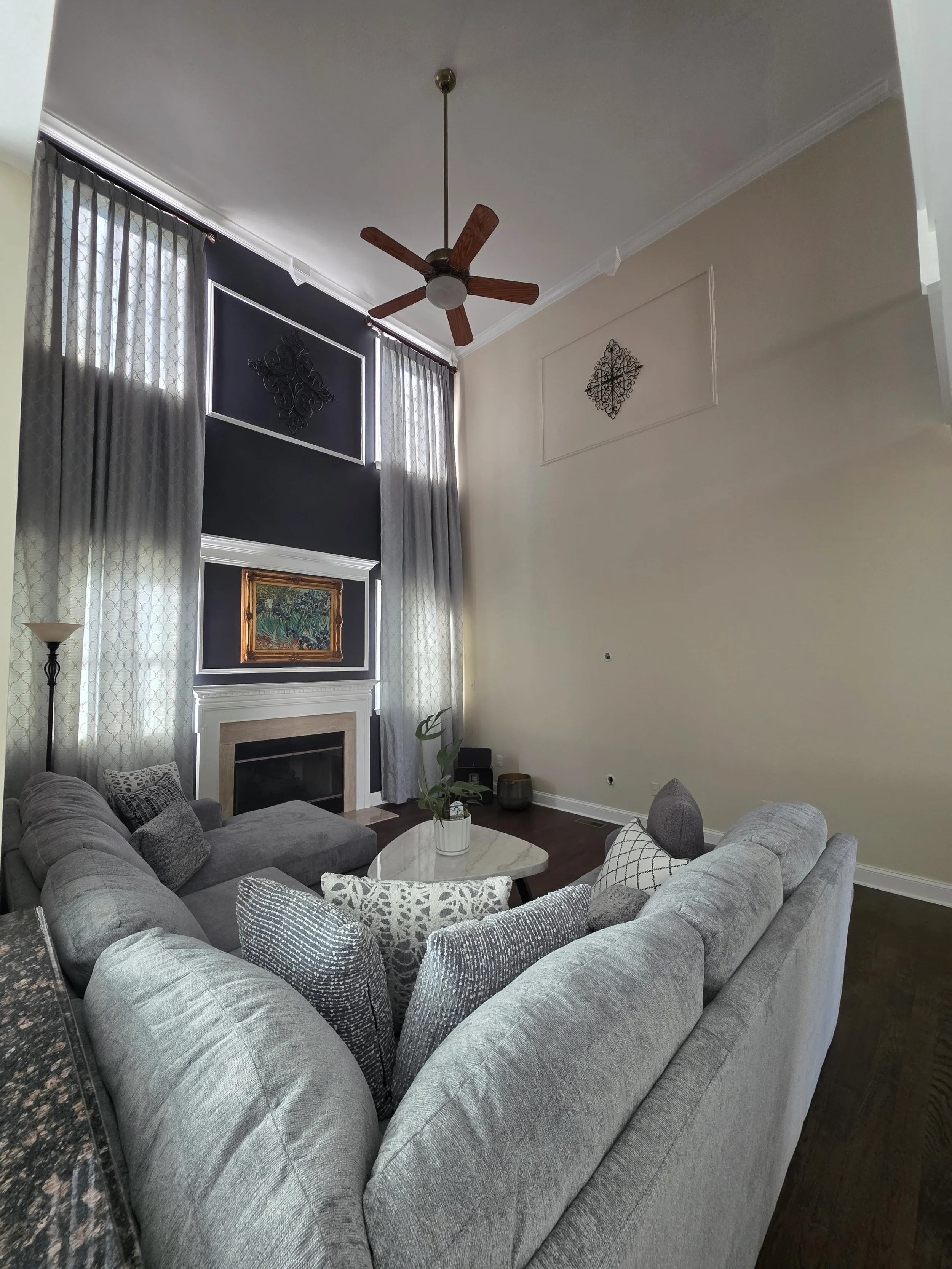 Painted living room walls above seating area.